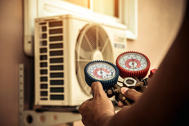 Professional Air Conditioning Service technician working in Arlington, GA